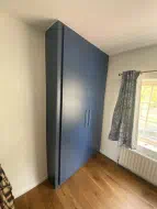 Alby blue wardrobe fitted in Stokesley where there was no level wall